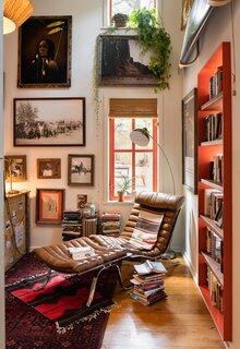 In Scott's office, a new steel window bookcase and the adjacent window are painted in the same International orange as the dining room windows and doors. "It's one of those colors that's followed me from California to Texas,