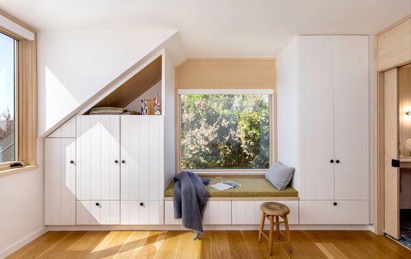 SHED embraced the angled corners with custom cabinetry. According to Hale, the inspiration images that the couple chose were “less American Midwest farmhouse, and more contemporary Scandinavian farmhouse,” which inspired the design team to consult Scandinavian farm layouts for the master plan.
