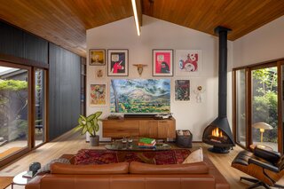 A Samsung Frame TV blends in with other artwork collected by the homeowners.