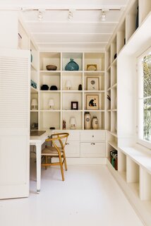 Built-ins are peppered throughout the space to maximize space while dually adding dimension.
