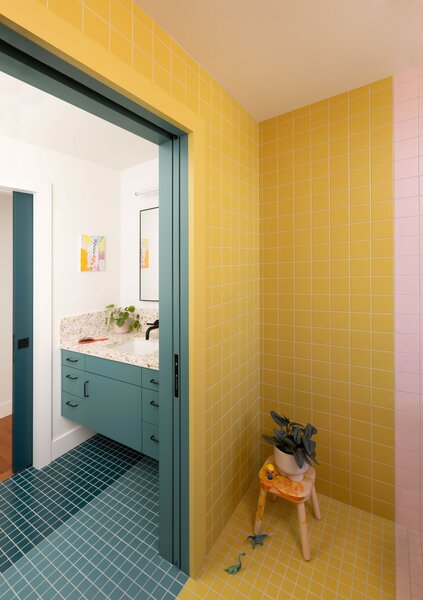 Colorful Ceramica Vogue tile steals the show on the home’s expanded upper level.