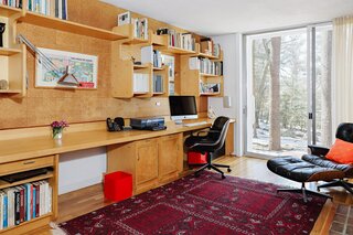 Flansburgh's office and study still contain his original built-in desks and shelving. 