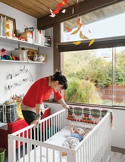 Baby Max’s bedroom (in his parents' Los Angeles A. Quincy Jones house) is outfitted with a Gulliver crib and a red PS cabinet, both from Ikea, as well as a Birds in Harmony mobile by Christel Sadde and Katsumi Komagata for the Museum of Modern Art Store. The custom “I brake for unicorns” neon sign is from Let There Be Neon, a shop in New York City.