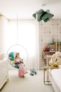 Pressey started her career photographing people, but she still likes to include them in her interior shots.  "Show the kids having fun in their rooms," she says. 