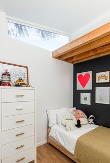 Raising the roof allowed for higher ceilings in the kids’ rooms and created an additional loft that they can use as a play space.